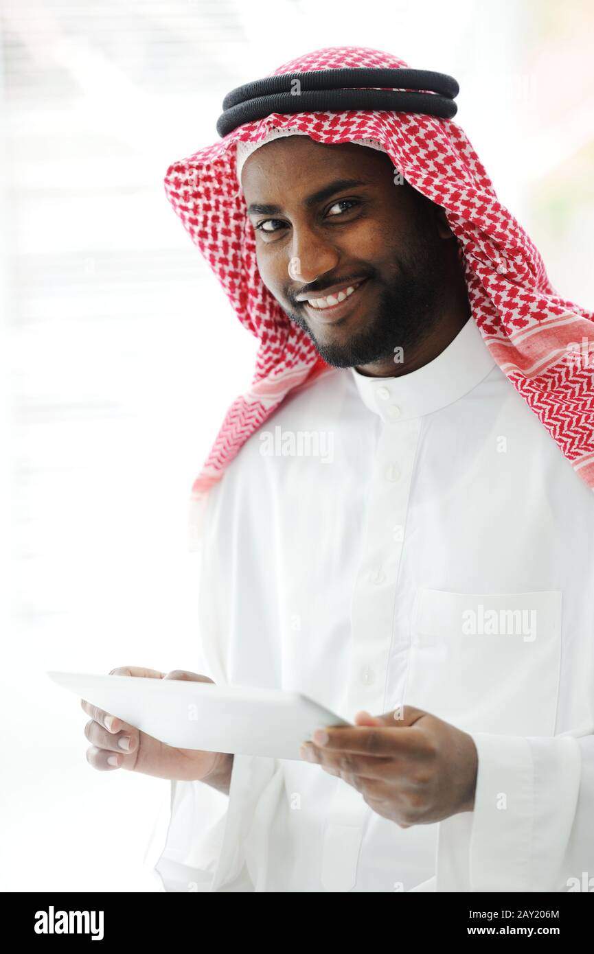 Arabic executive person using tablet at office Stock Photo