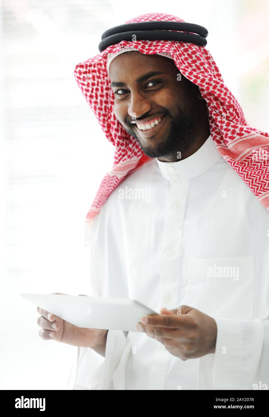 Arabic executive person using tablet at office Stock Photo