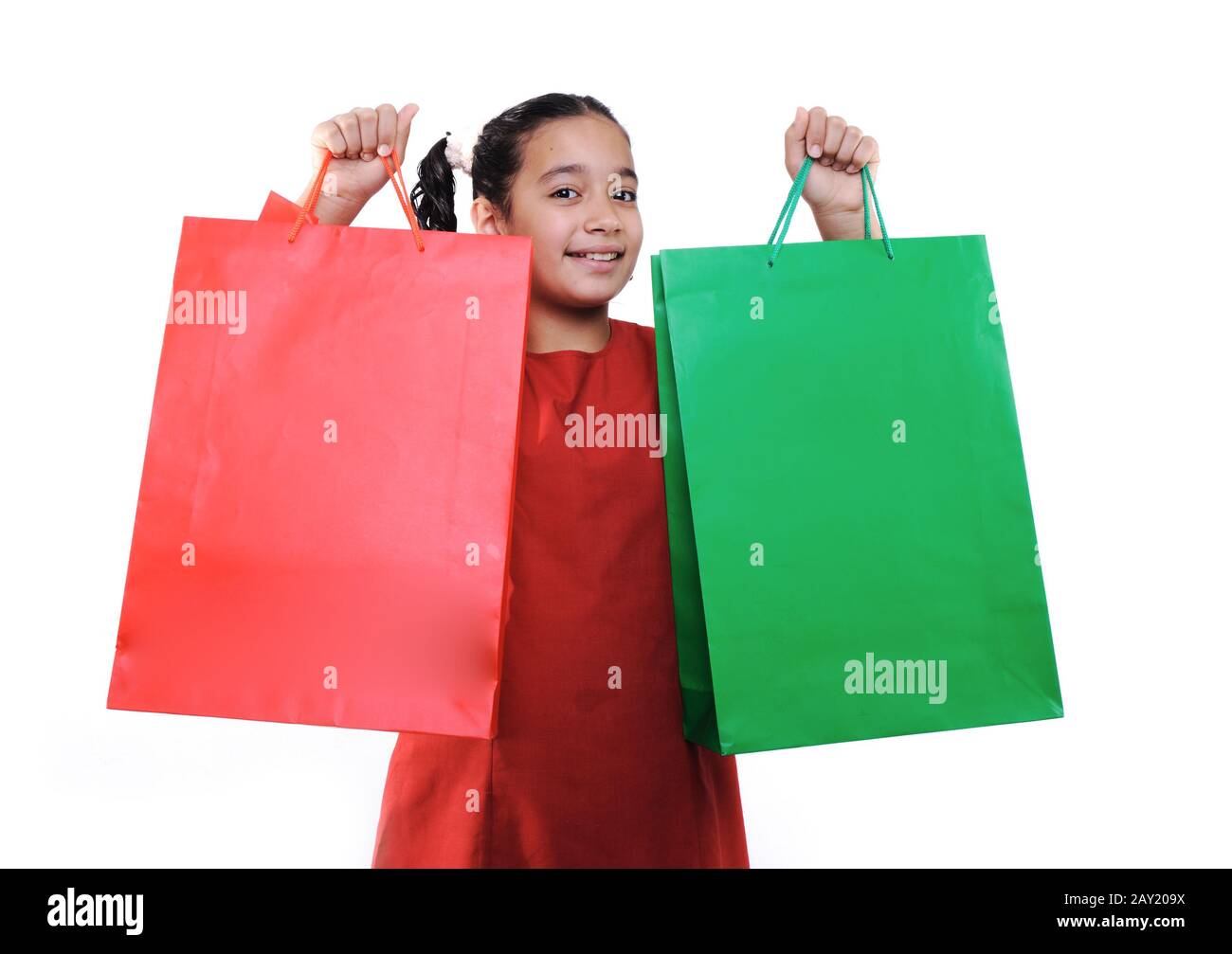 Little girl with shopping bags and boxes Stock Photo Alamy