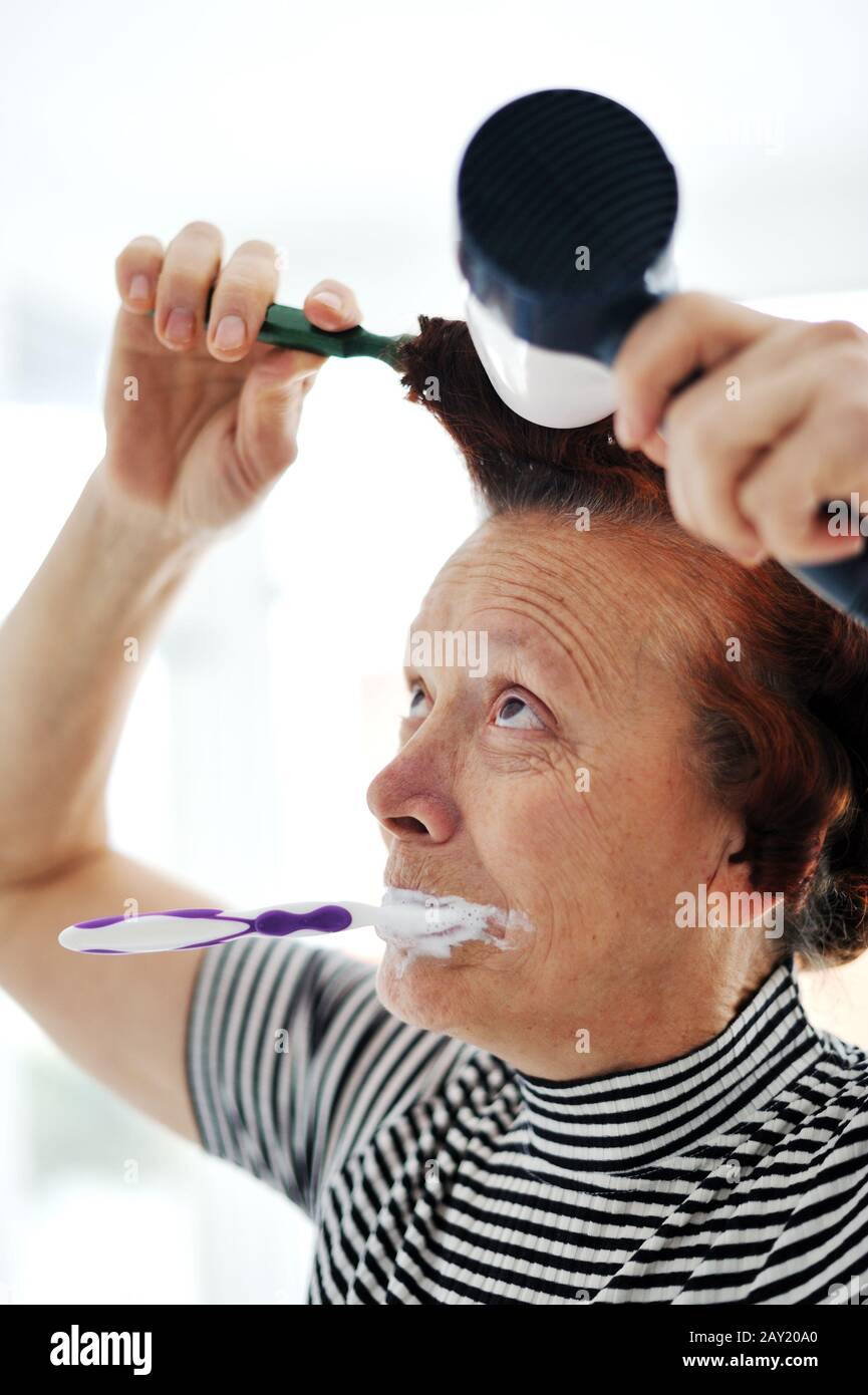 Woman drying hair fan hires stock photography and images Alamy