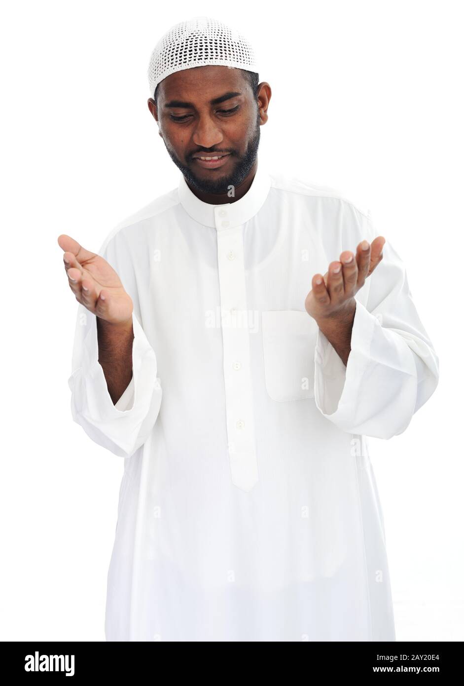 Black arabic man praying Stock Photo