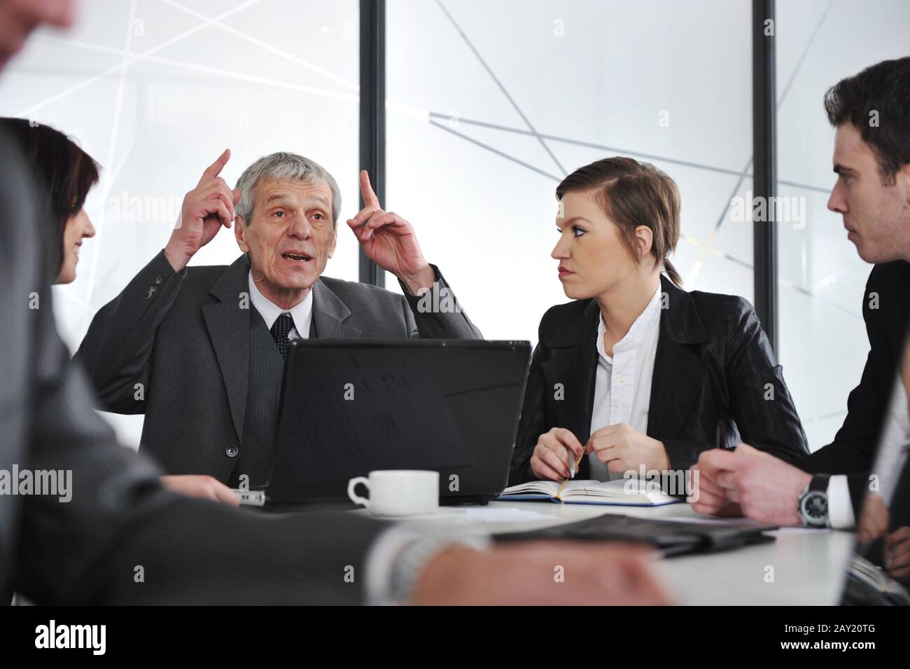 Group of business people having a discussion in office Stock Photo