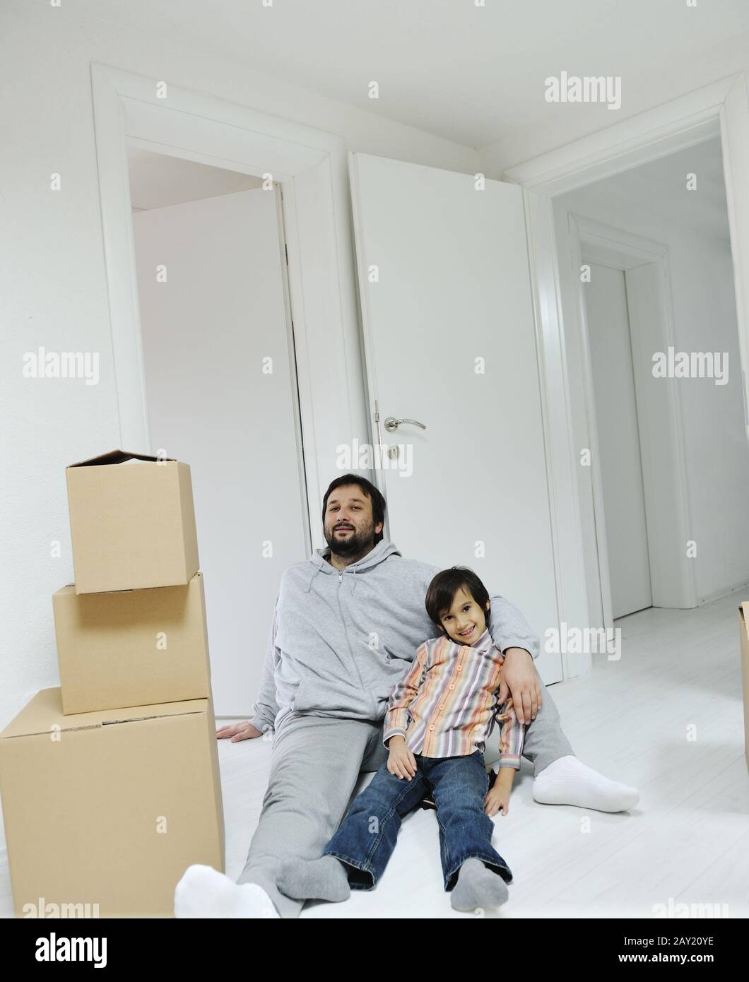 Father and son at home hi-res stock photography and images - Alamy