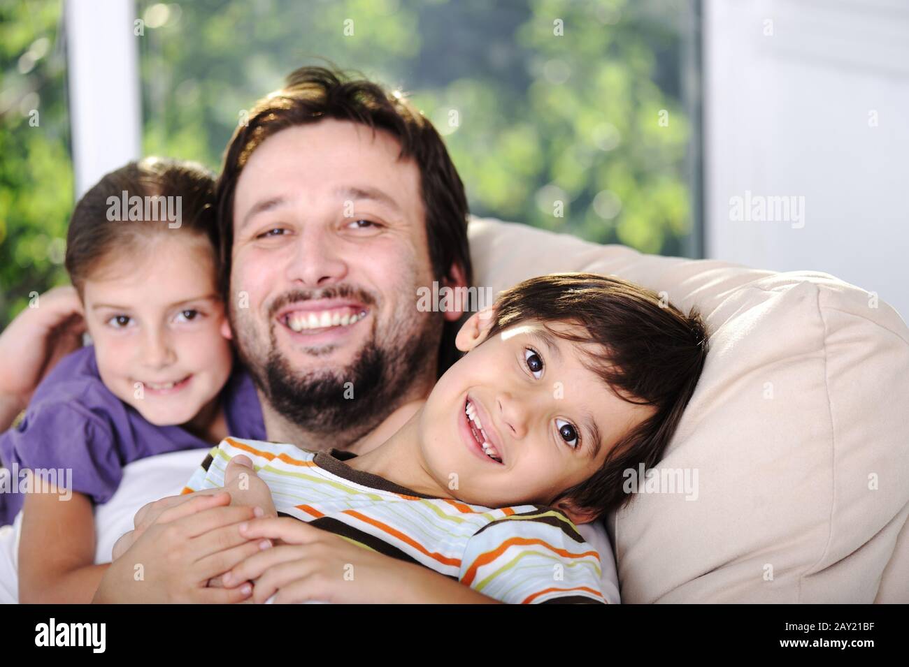 Father son and daughter at home Stock Photo