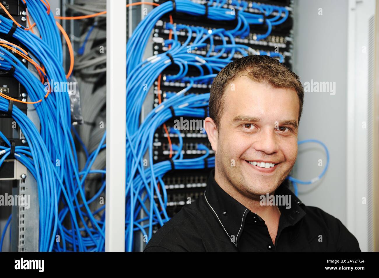 Administrator at server room Stock Photo