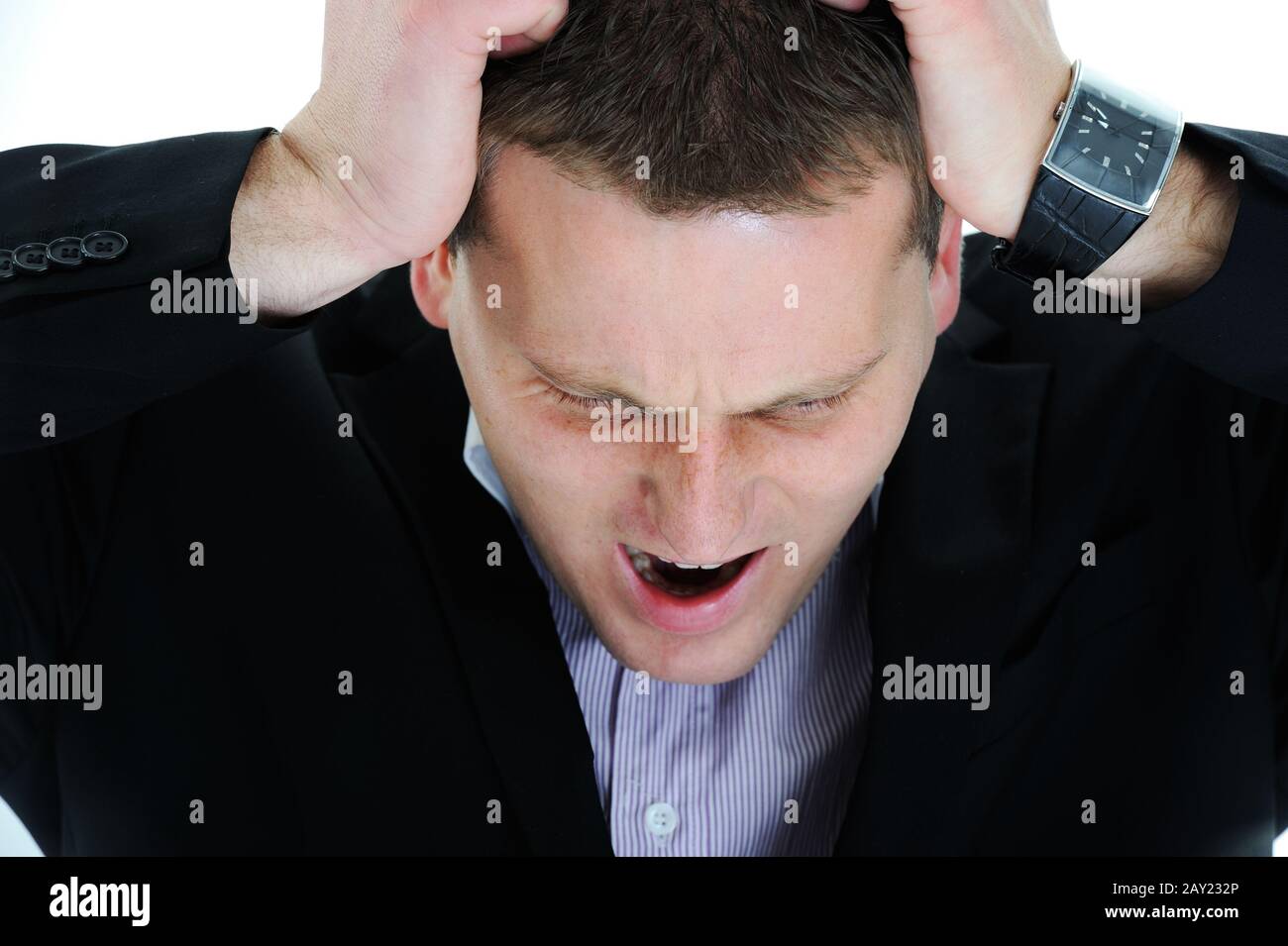 Young man having headache Stock Photo