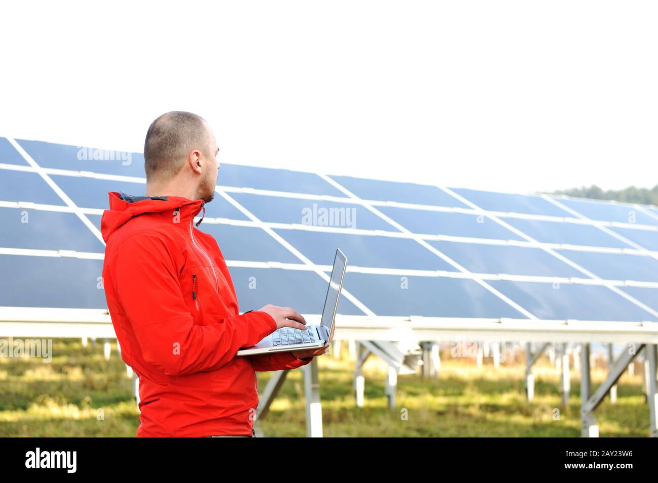 Male engineer using laptop Stock Photo