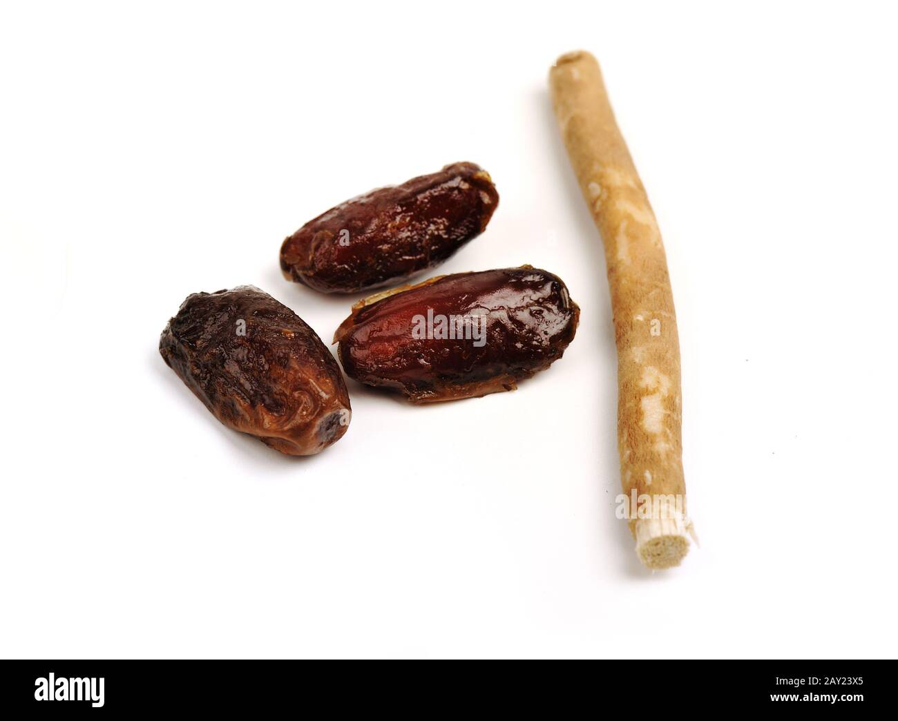 Preparing for Ramadan, dates and siwak (traditional teeth brush Stock