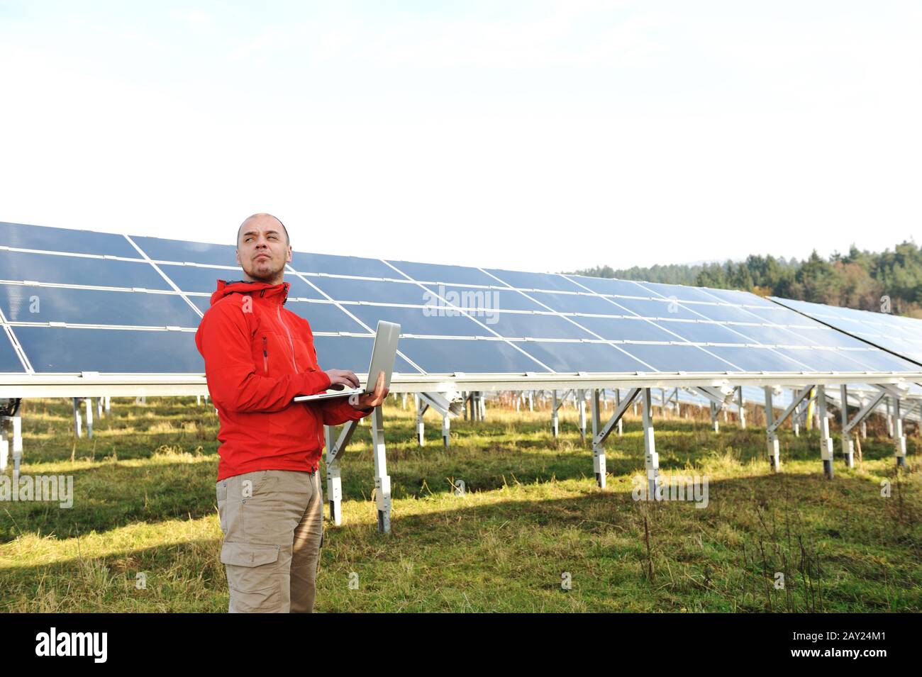 Male engineer using laptop Stock Photo