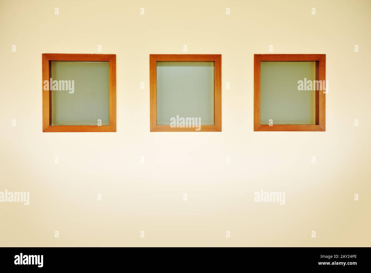 Three frames on wall Stock Photo Alamy