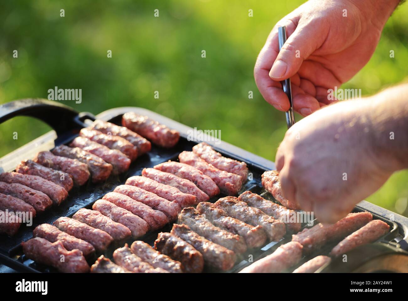 Barbecue BBQ grill outdoors Stock Photo - Alamy