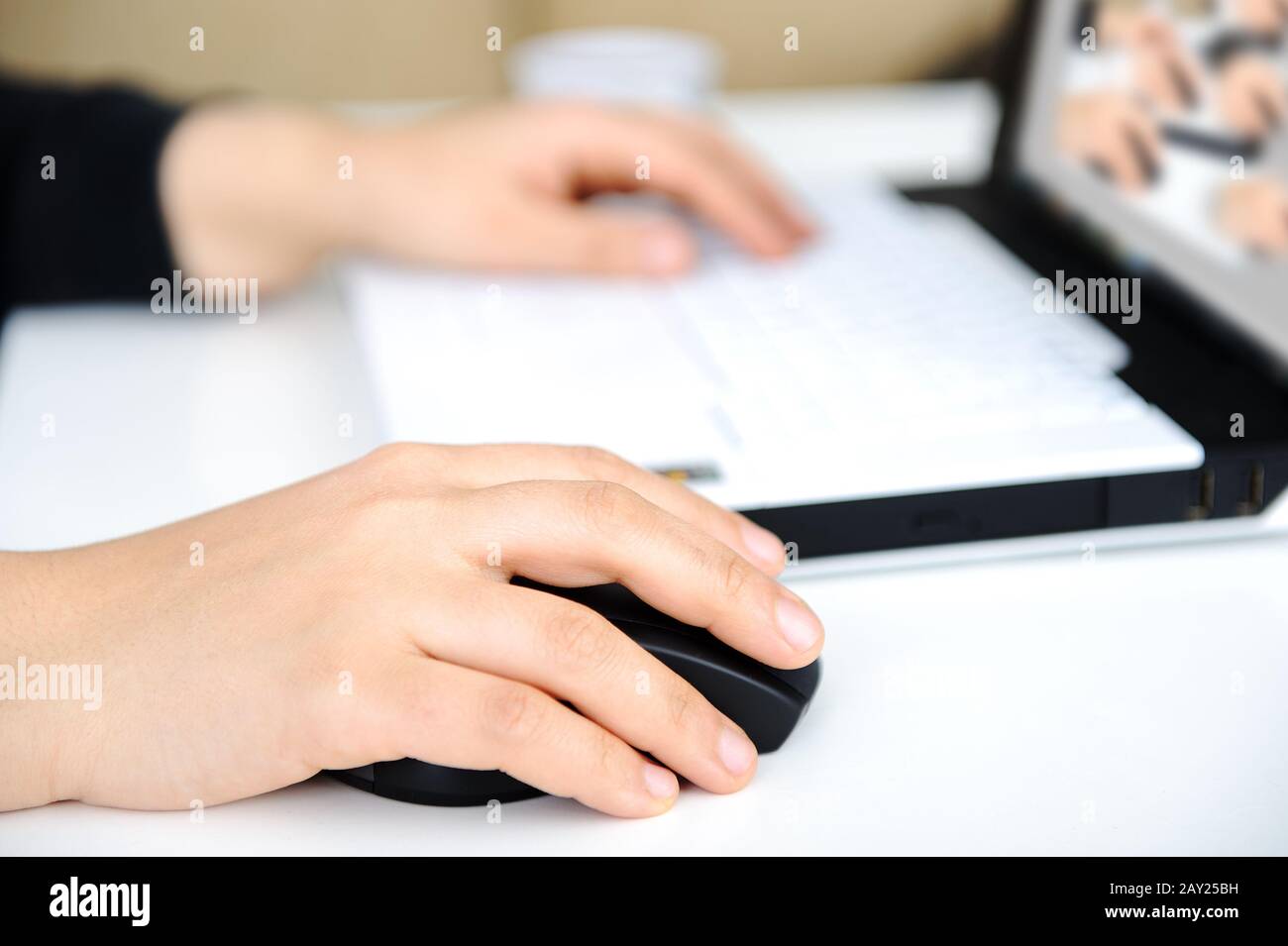 Hands on notebook Stock Photo