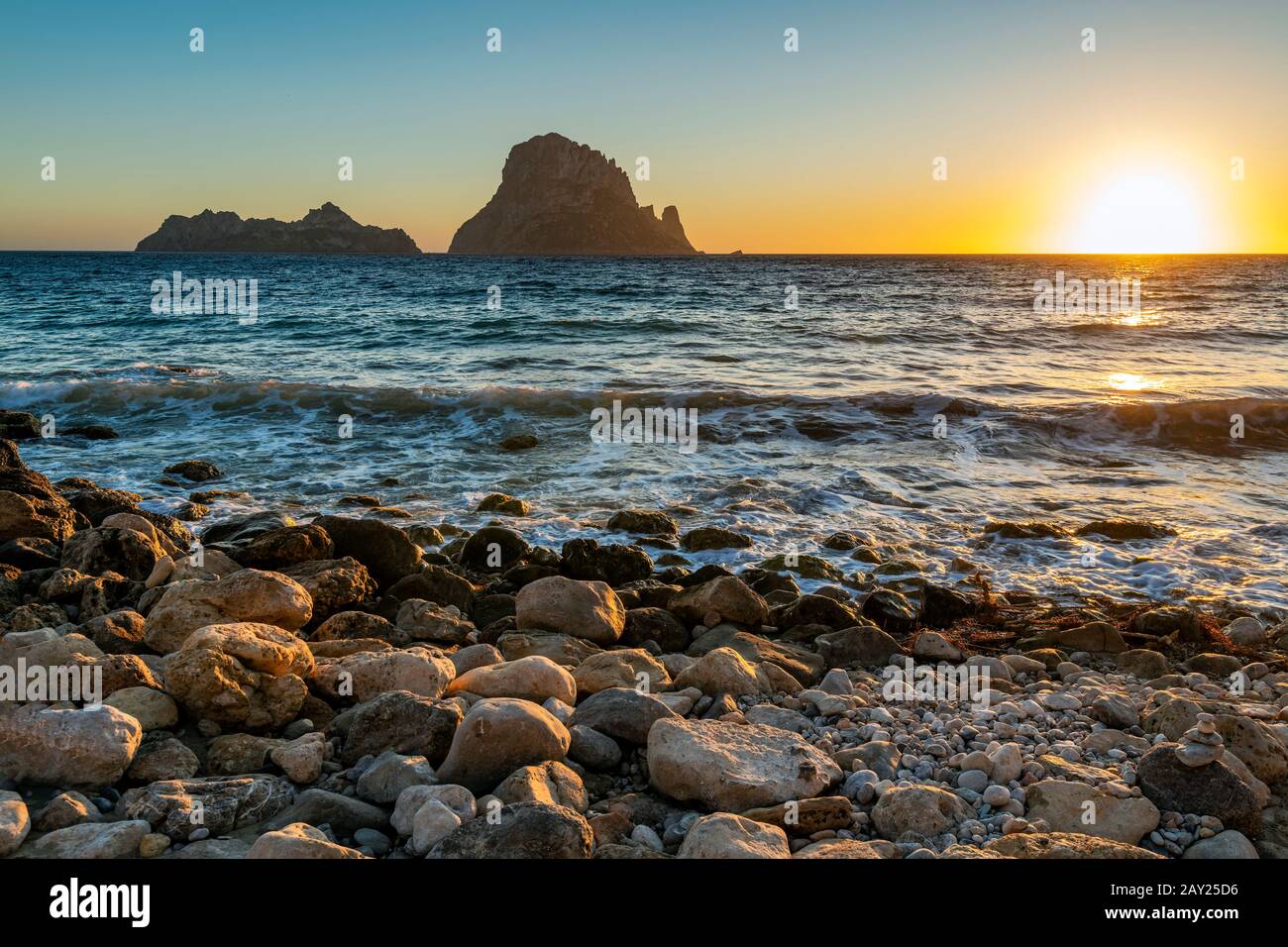 Sunset at Cala d'Hort beach, Ibiza, Balearic Islands, Spain Stock Photo