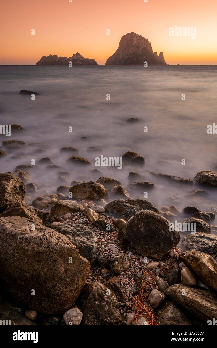 Sunset at Cala d'Hort beach, Ibiza, Balearic Islands, Spain Stock Photo