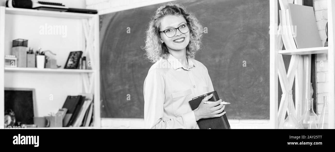 Teacher pretty woman enjoy educational process. onstantly learning new skills. Girl adorable teacher in classroom. Formal education. Teachers day. Teacher difficult but very rewarding profession. Stock Photo