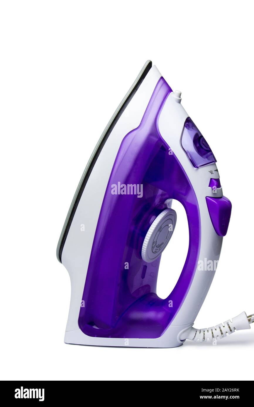 Blue electric steam iron isolated on white background. Home ironing machine and linen Stock Photo