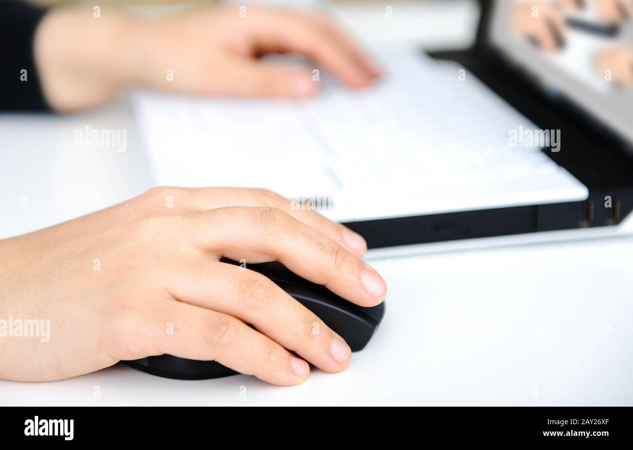 Hands on notebook Stock Photo