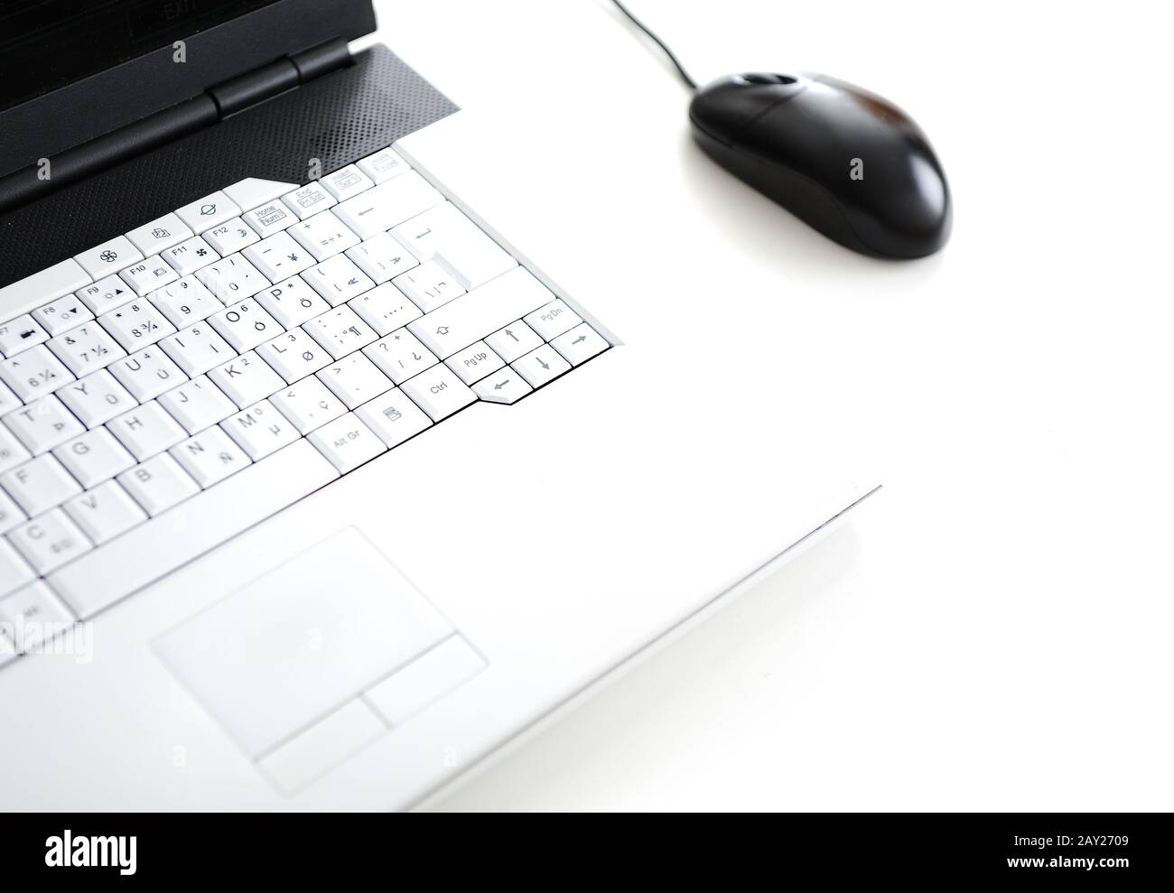 Laptop on white table Stock Photo