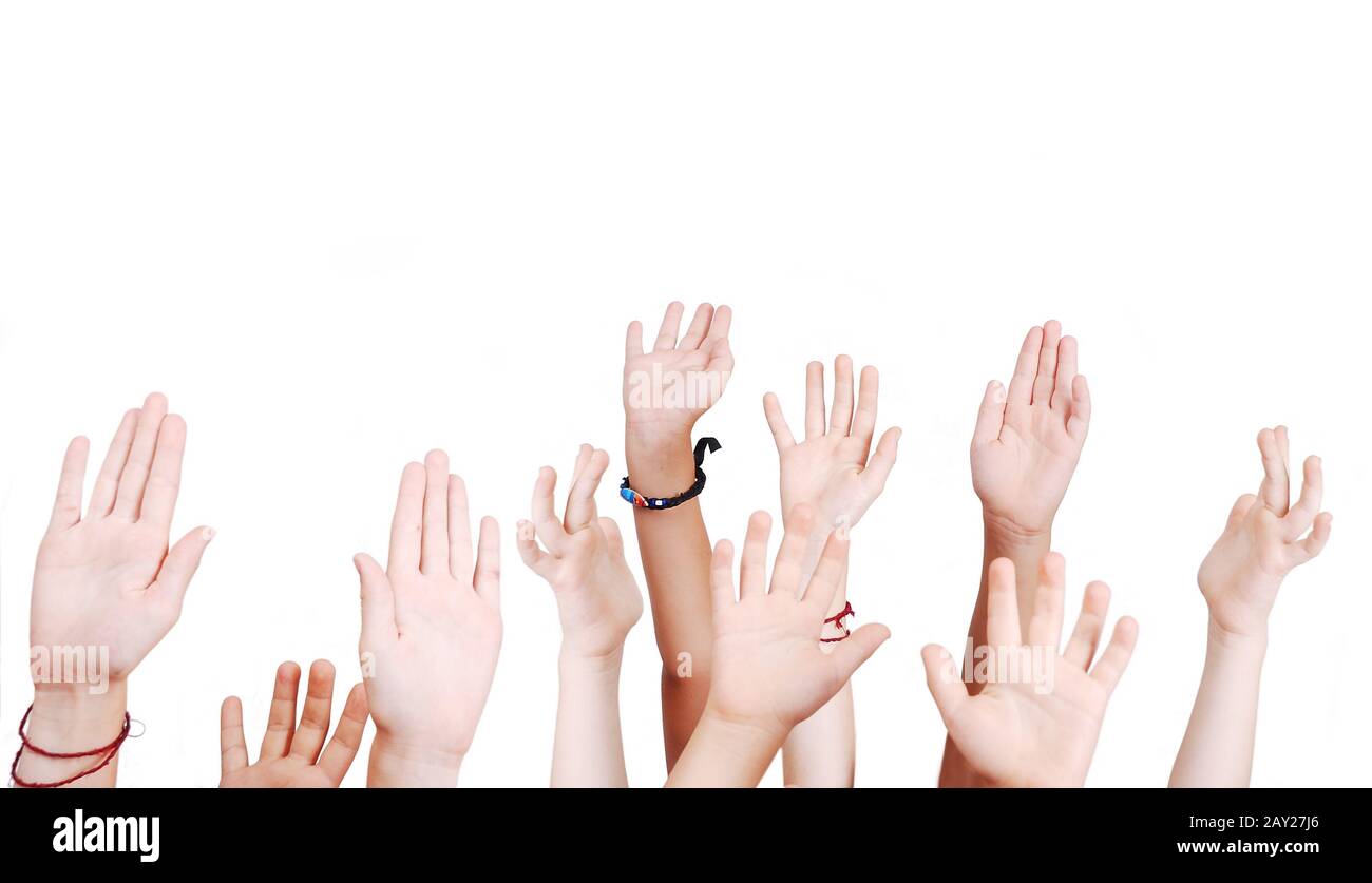 Many children hands high up isolated Stock Photo