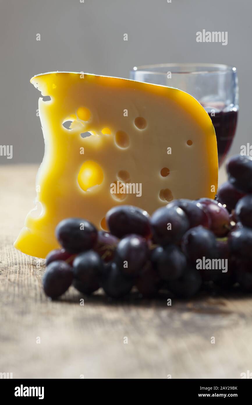 Swiss cheese, grapes and red wine Stock Photo Alamy