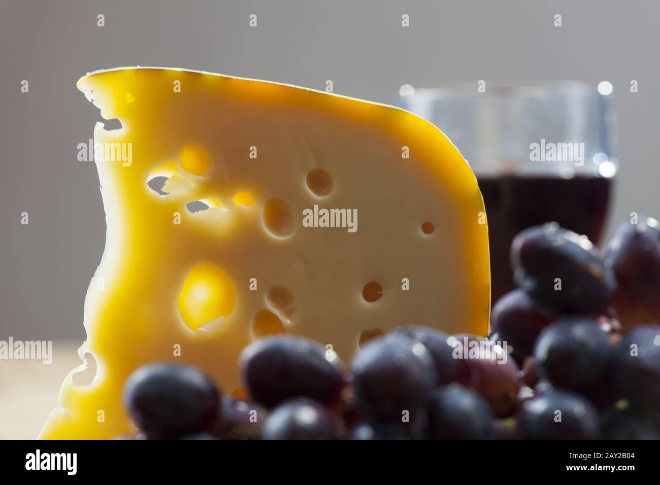 Swiss cheese, grapes and red wine Stock Photo Alamy