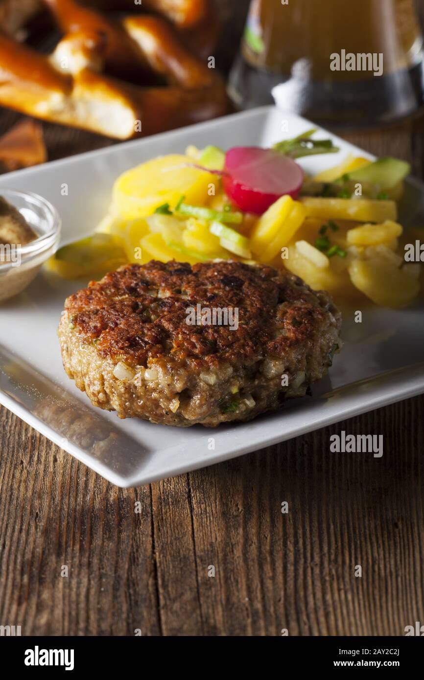 Bavarian meat loaf with potato salad Stock Photo Alamy