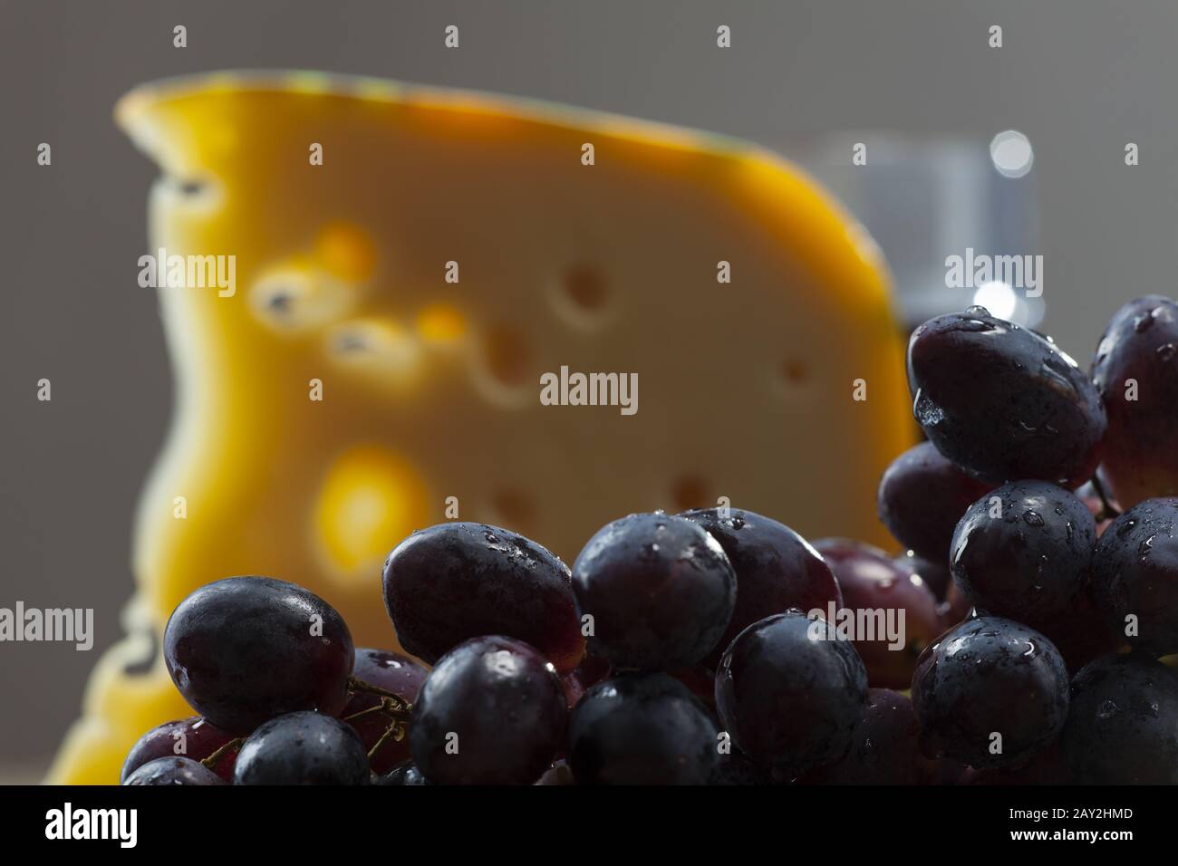Swiss cheese, grapes and red wine Stock Photo Alamy