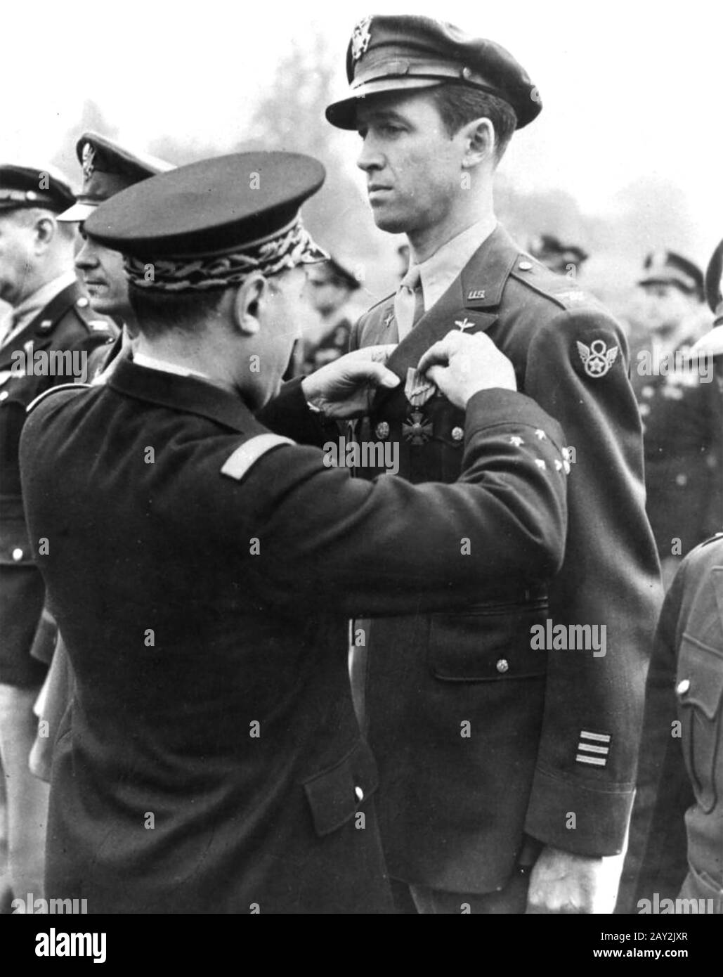 JAMES STEWART (1908-1997) American film actor and soldier receiving the French Croix de Guerre with Palm in 1944 Stock Photo