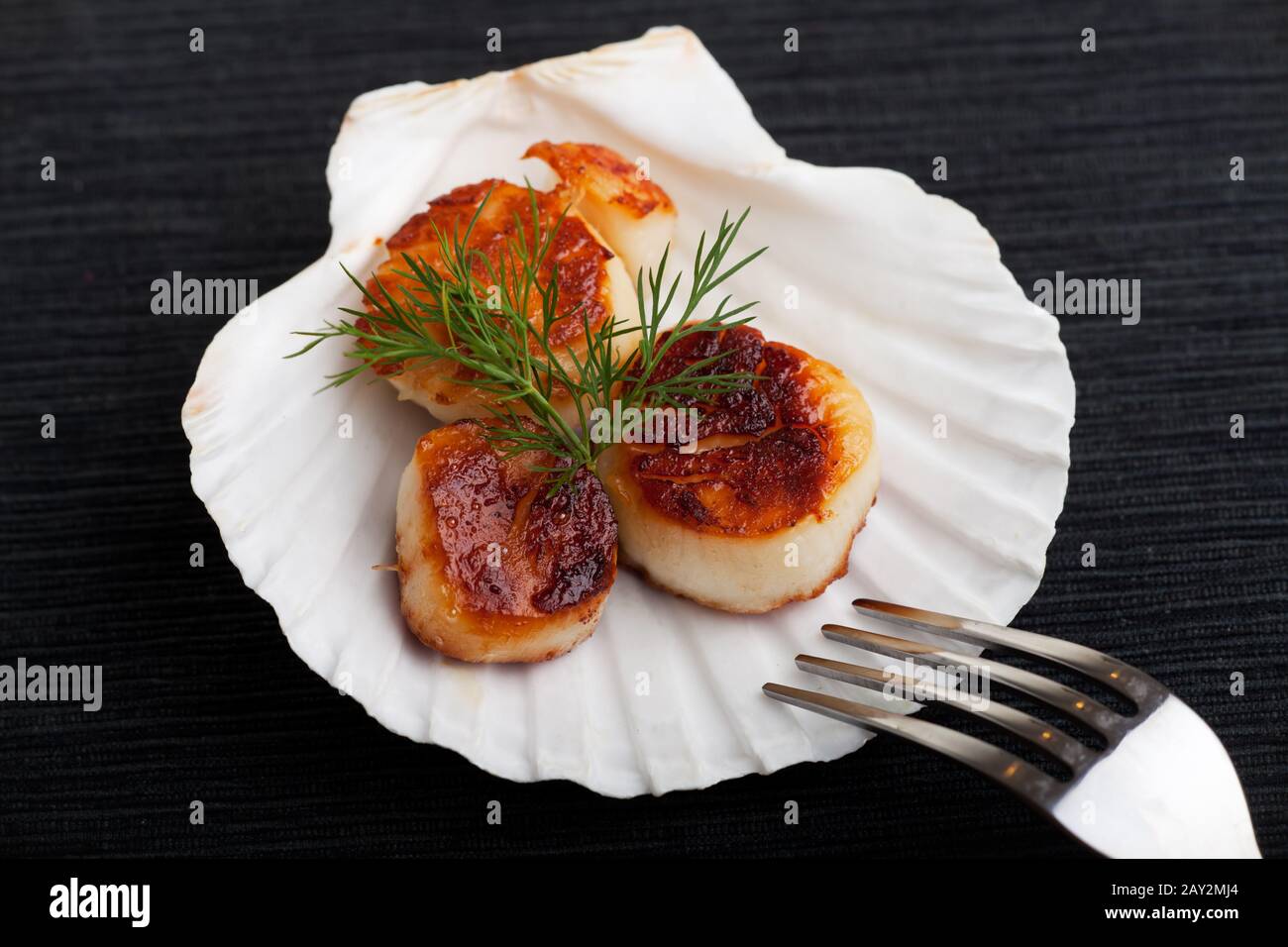 grilled scallops in shell Stock Photo Alamy