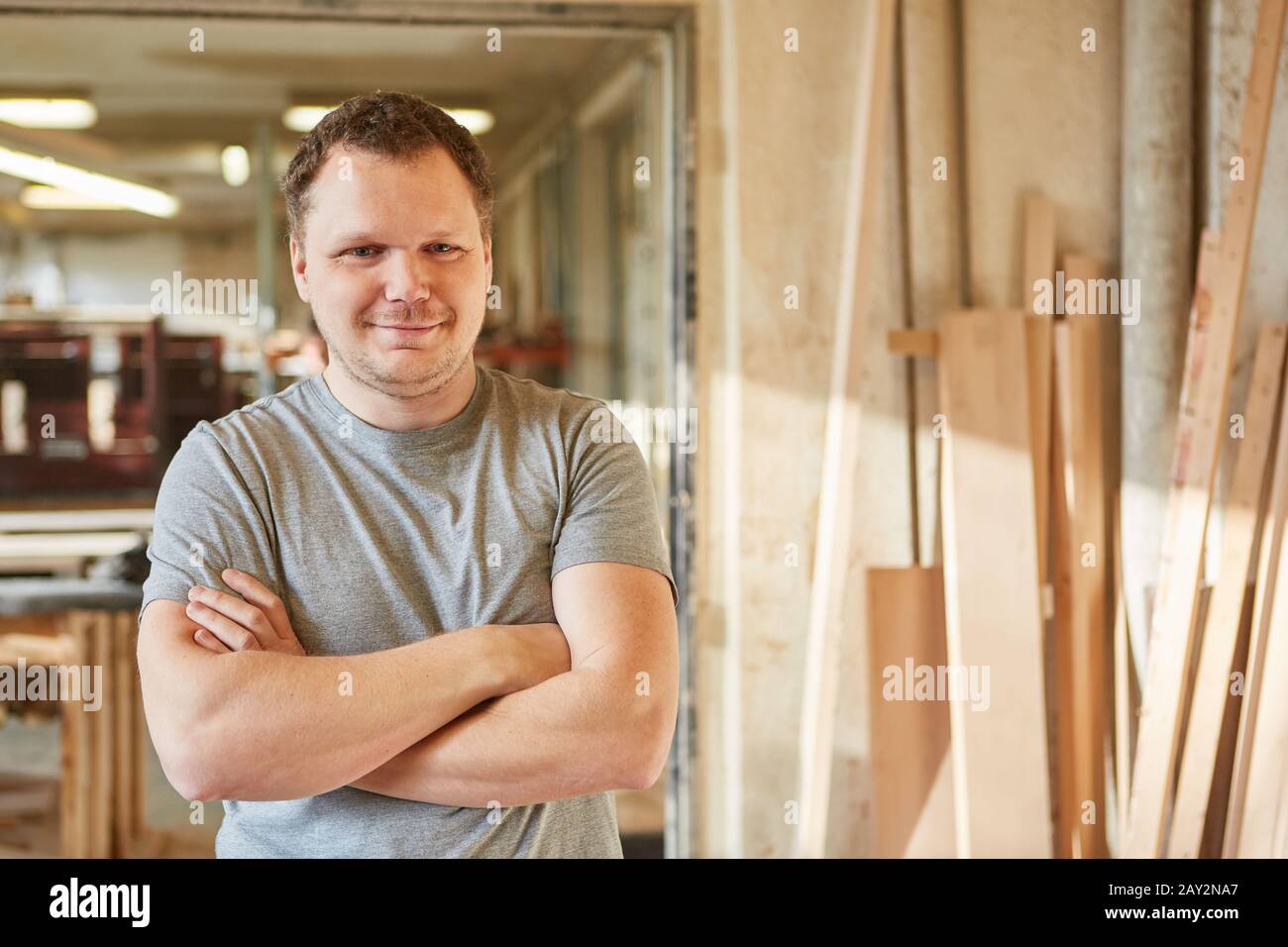 Self-confident carpenter as head of a carpentry or joinery Stock Photo