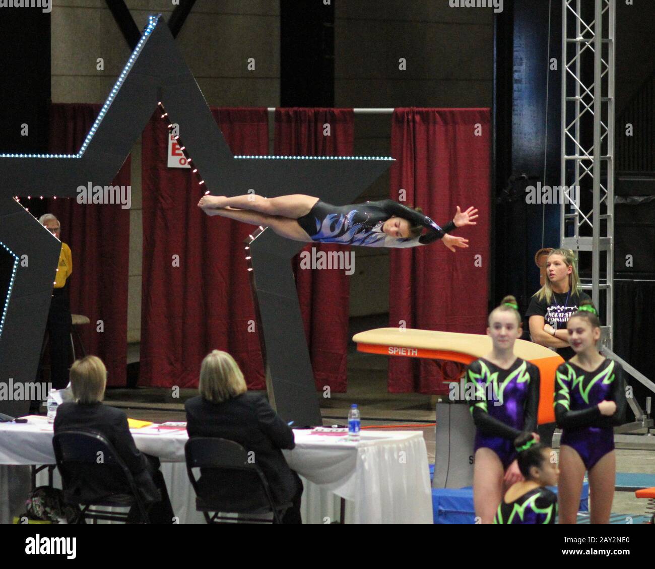 Xcel Gymnast Half On Half Off Vault Stock Photo Alamy