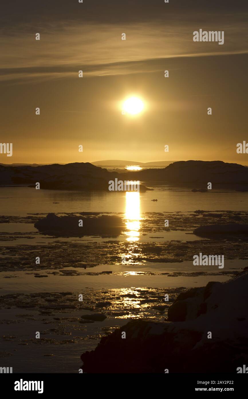 Antarctic icebergs and islands in the setting of the spring sun Stock ...