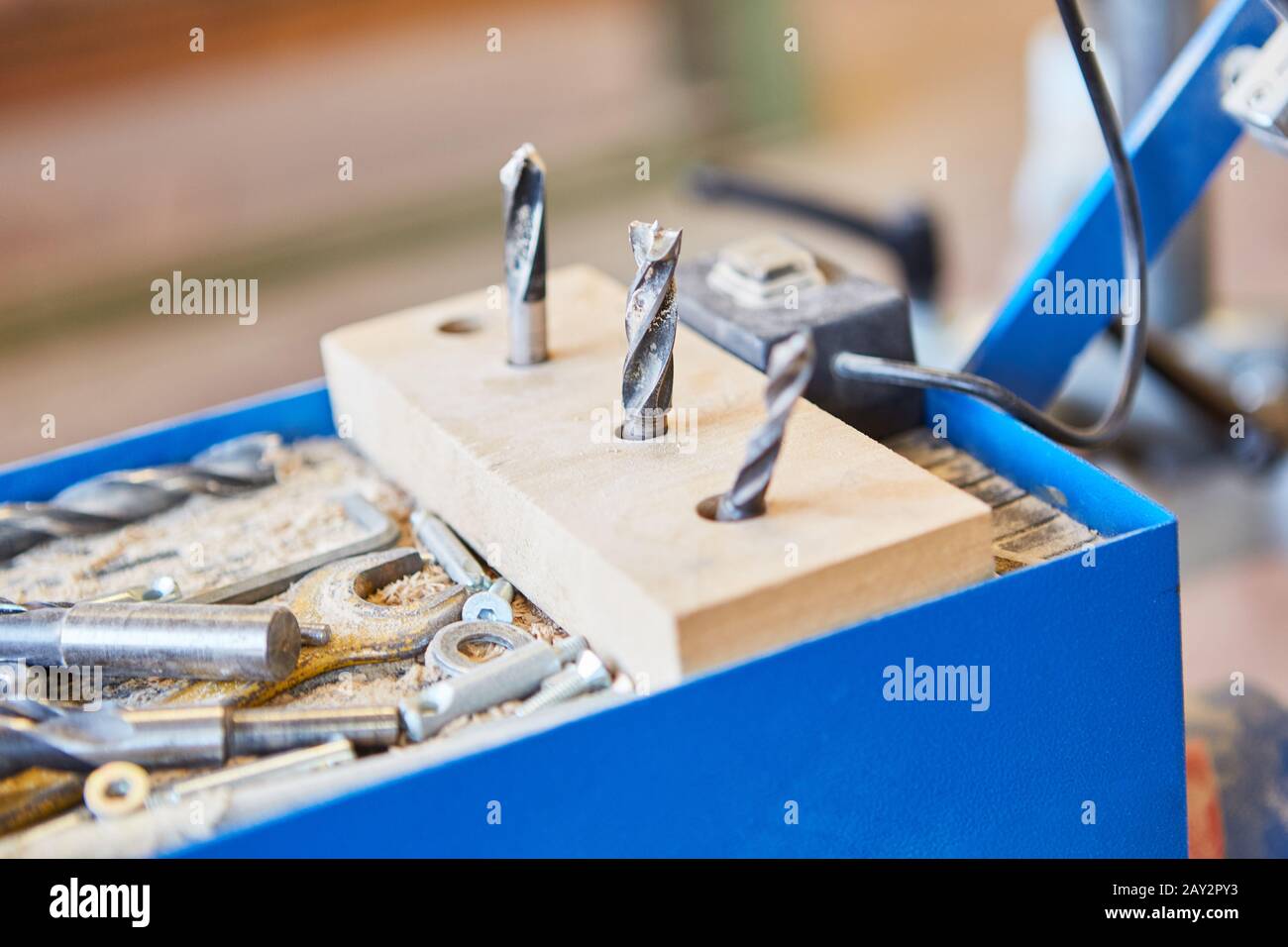 Various twist drills in a carpentry or carpentry workshop Stock Photo