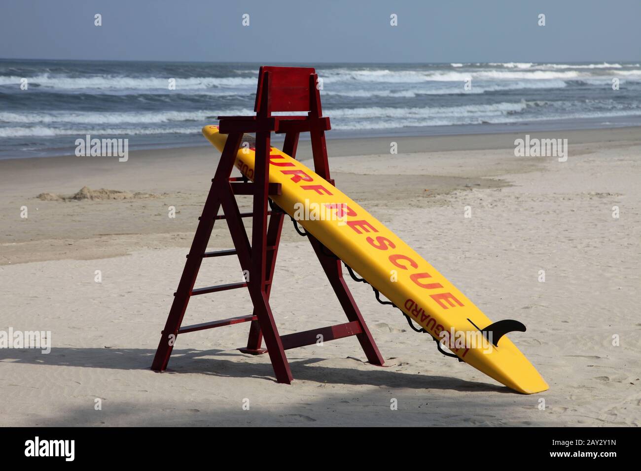 Surf Rescue from rescuer on a beach with nobody around Stock Photo