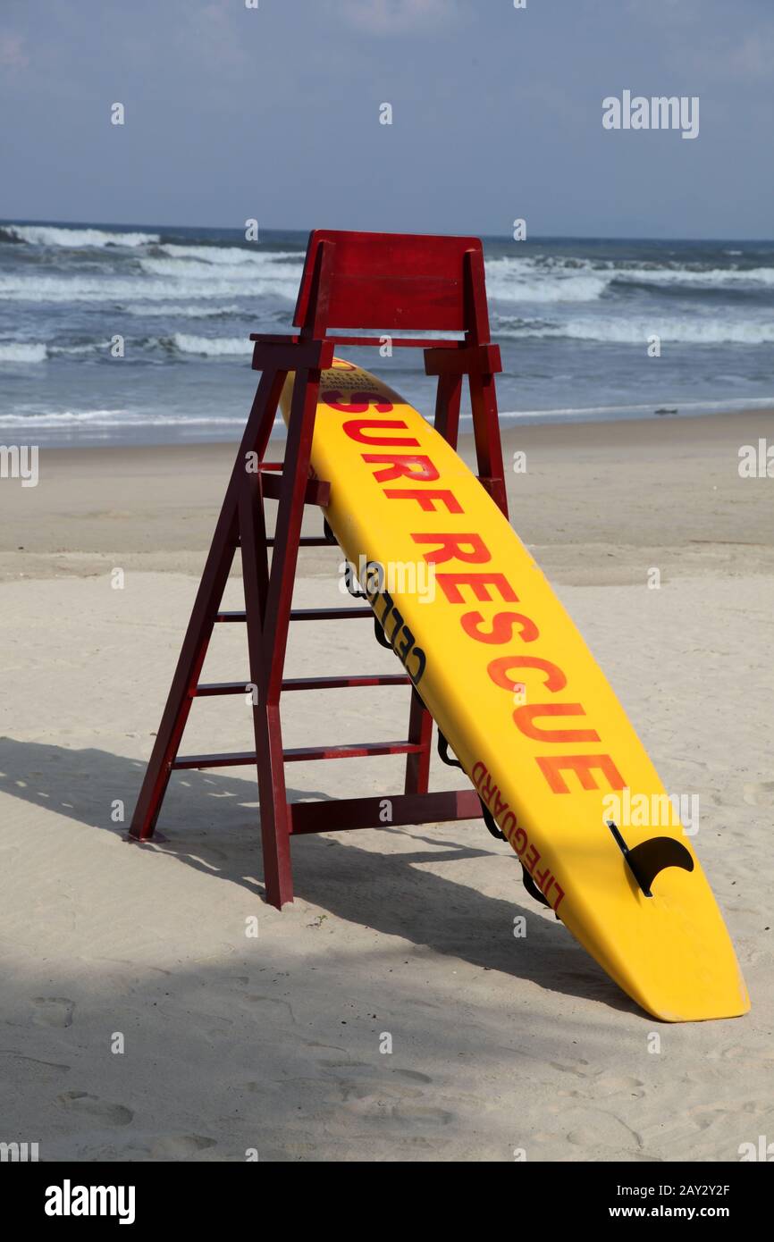 Surf Rescue from rescuer on a beach with nobody around Stock Photo