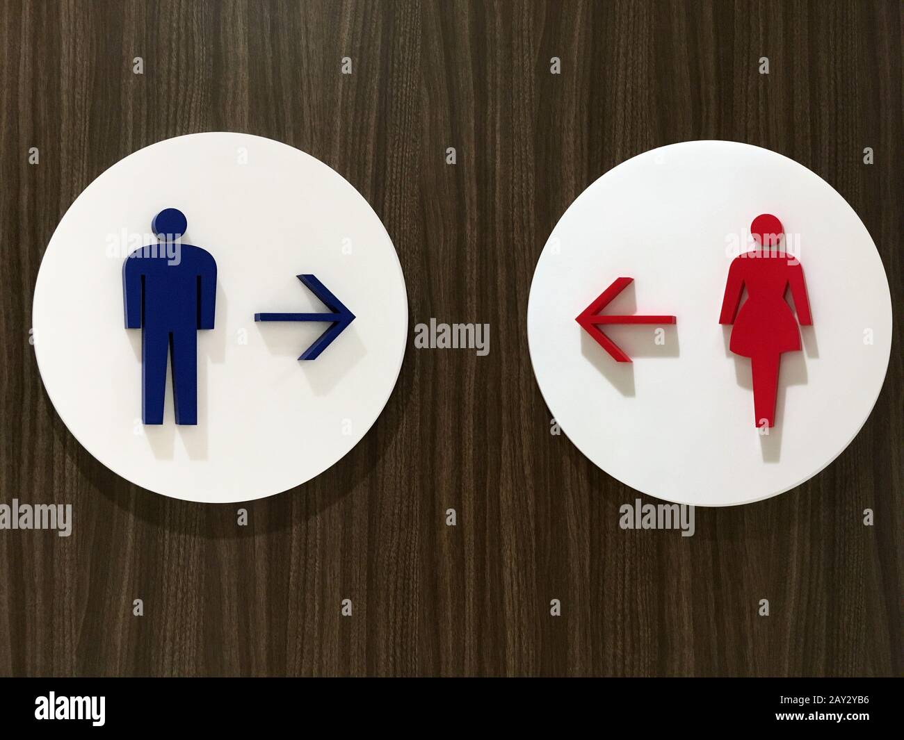 it's a photo of a toilets sign board indication in a mall or public place Stock Photo