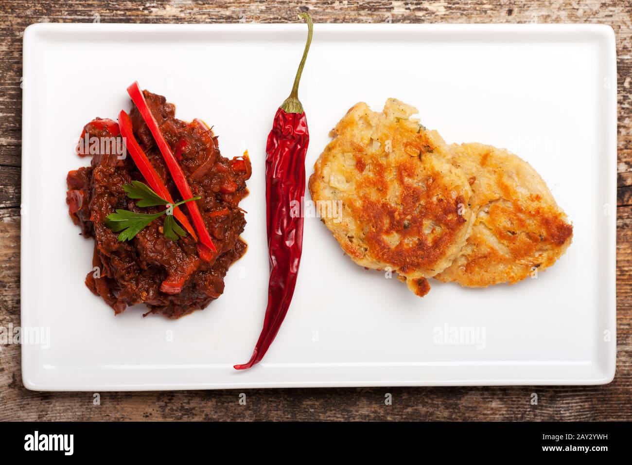 Goulash and fried bread dumplings Stock Photo