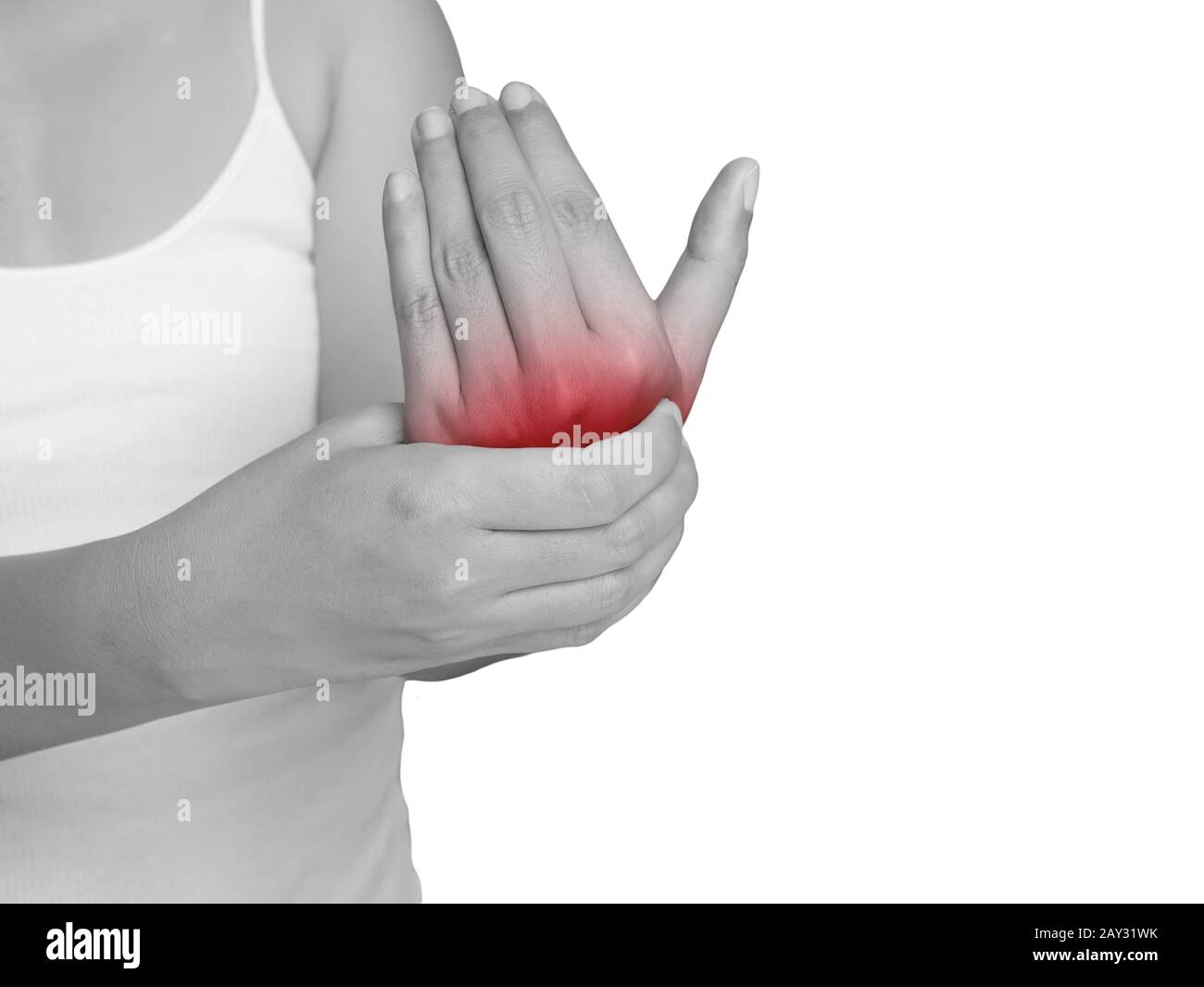 woman suffering from pain in hand. mono tone highlight at hand isolated on white background. health care and medical concept Stock Photo