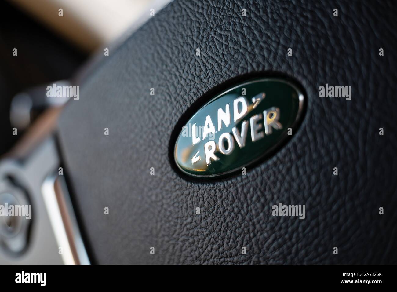 Zurich, Switzerland - November 21, 2019: Land Rover logo on the steering wheel of Discovery SUV Stock Photo