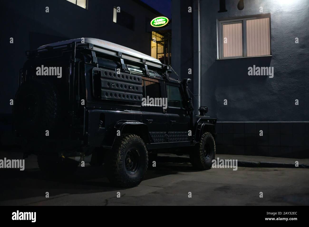 Moscow, Russia - November 20, 2019: Offroad monster Land Rover Defender 110 at night Stock Photo