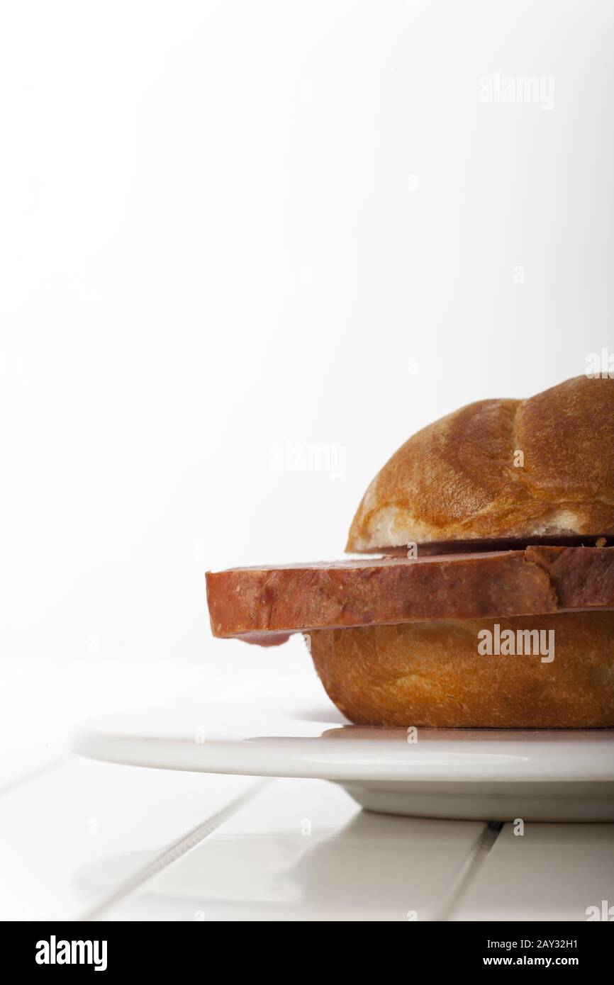 Bavarian Leberkäse in a bread roll Stock Photo