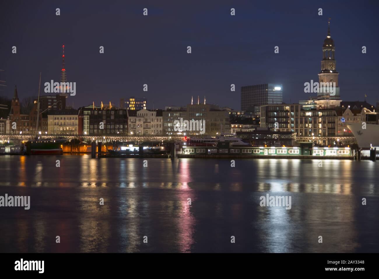 Skyline of Hamburg with st. Michaelis by night, Ge Stock Photo