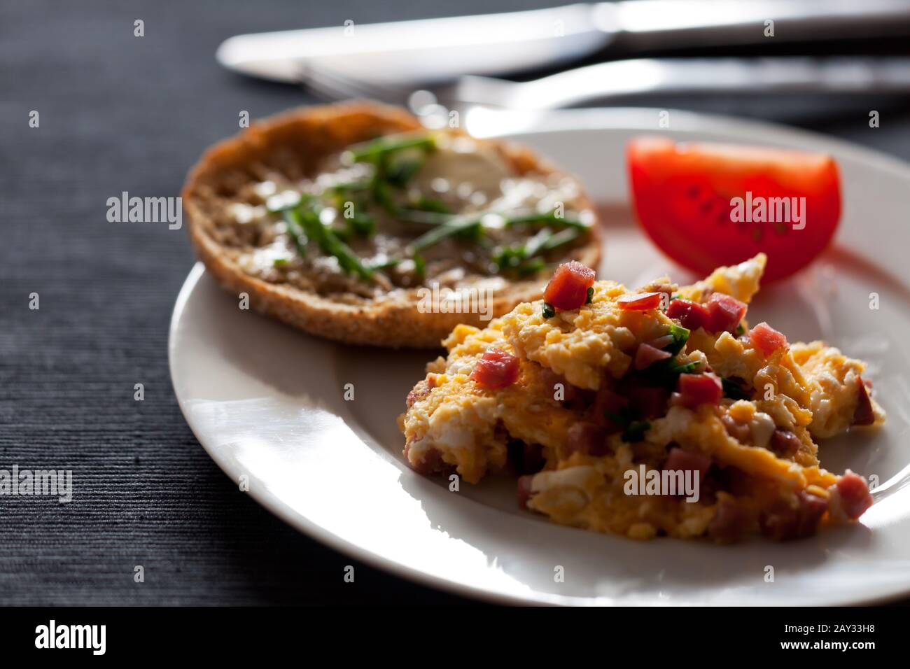Scrambled eggs with diced ham Stock Photo Alamy