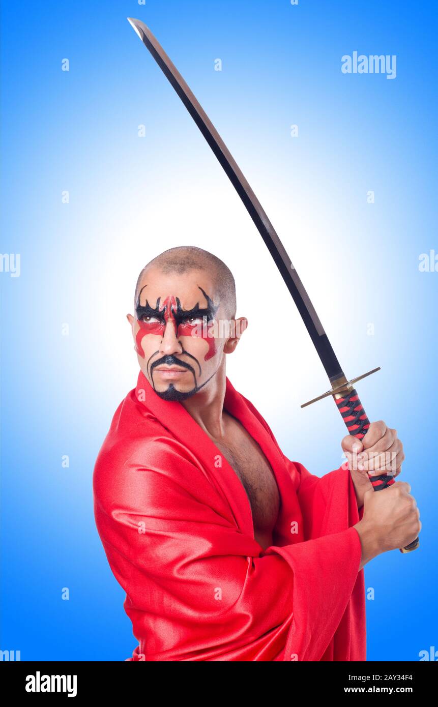 Man with sword isolated on white Stock Photo