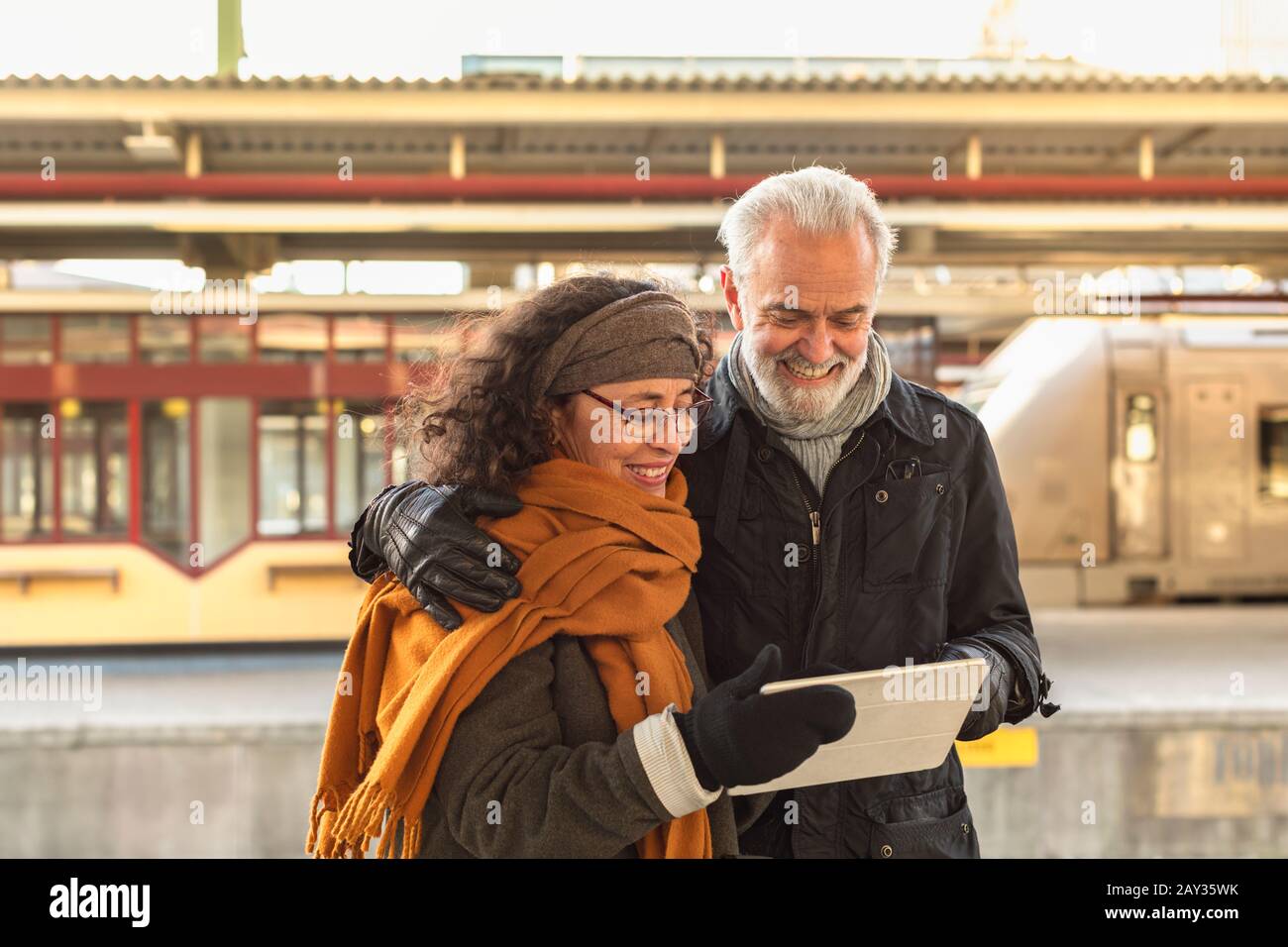 Mature couple using digital tablet Stock Photo