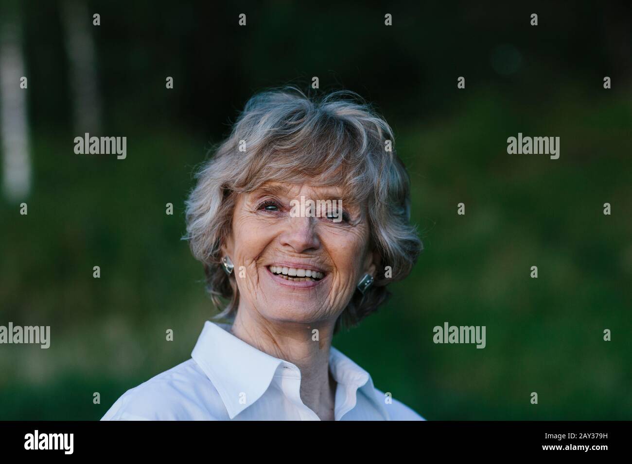 Positive senior woman hi-res stock photography and images - Alamy