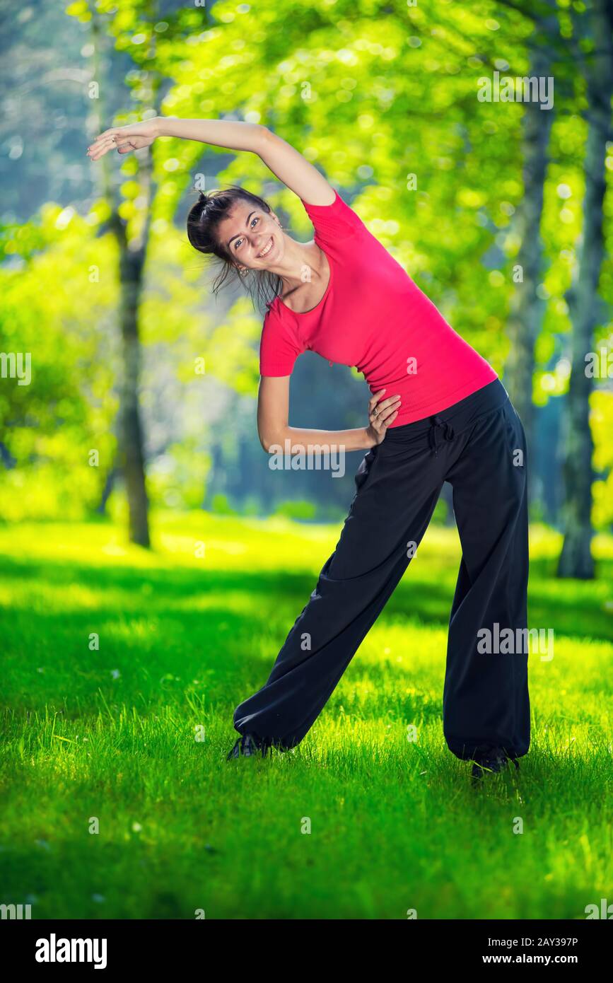 Stretching woman in outdoor sport exercise Stock Photo Alamy