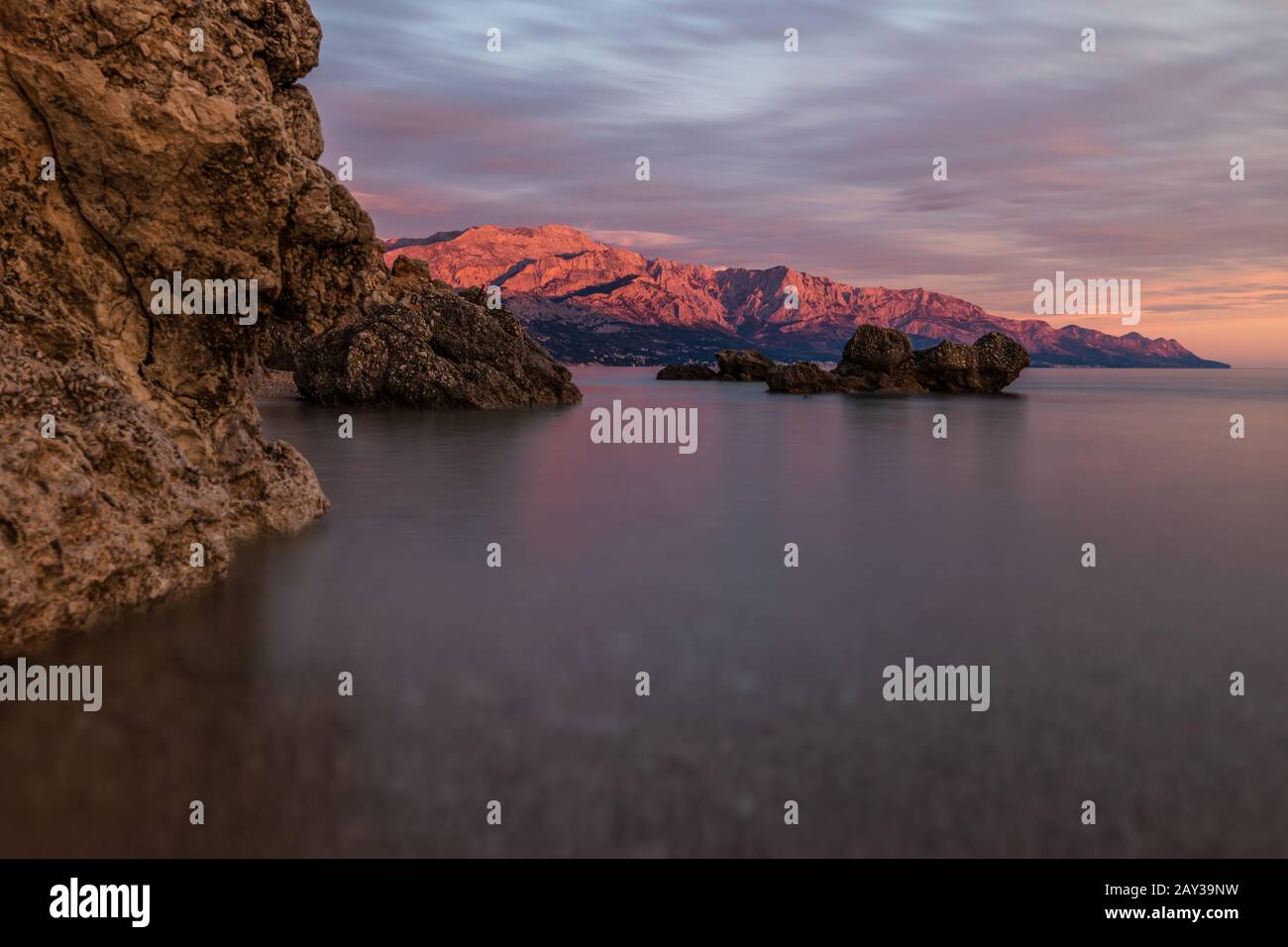 Beautiful sunset at the beach Stock Photo - Alamy