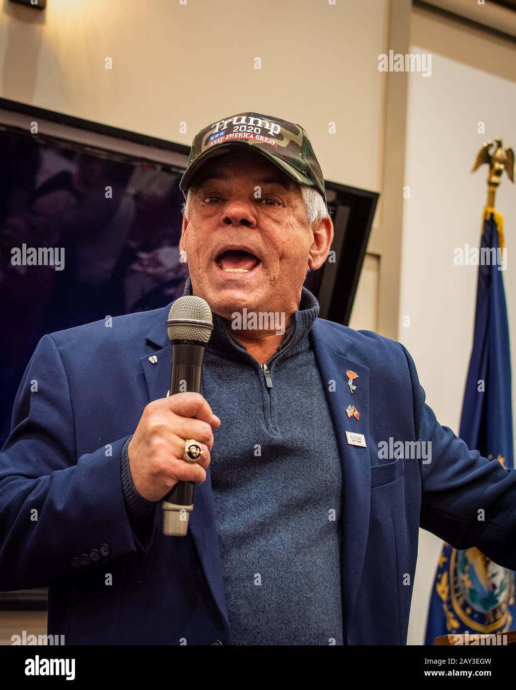 New Hampshire House of Representatives Al Baldasaro speaks from a podium in NH during the GOP 2020 primary celebration. Stock Photo