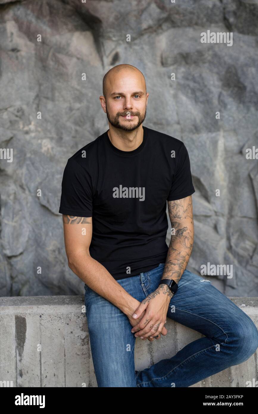Smiling man looking at camera Stock Photo - Alamy